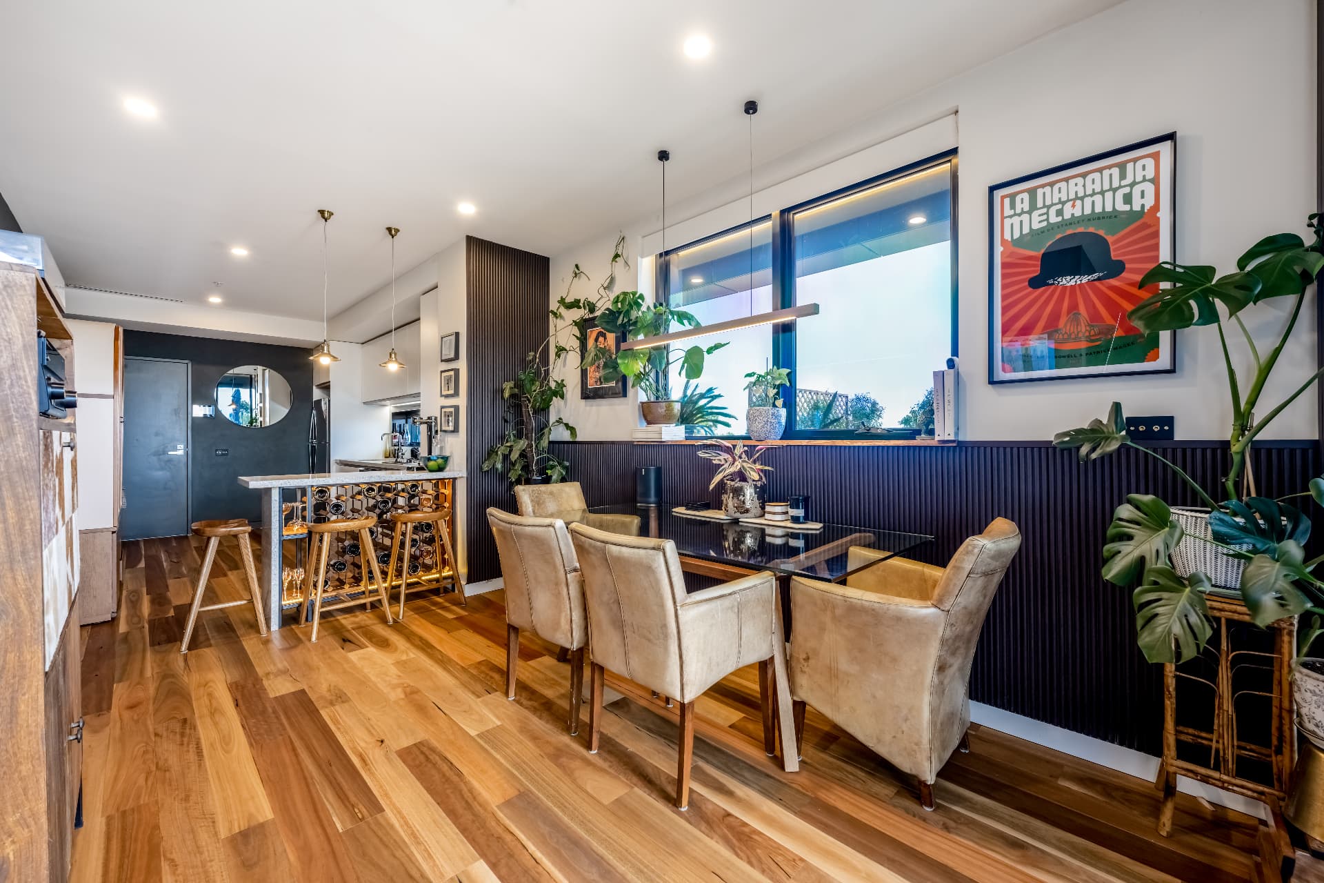 Dining area with fluted panelling and breakfast bar